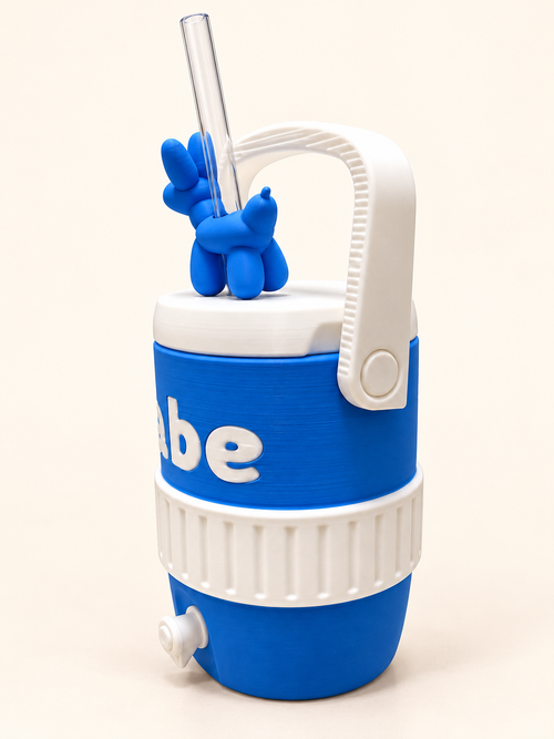Side view of blue and white custom can cooler on warm cream background; dog topper shown as an example