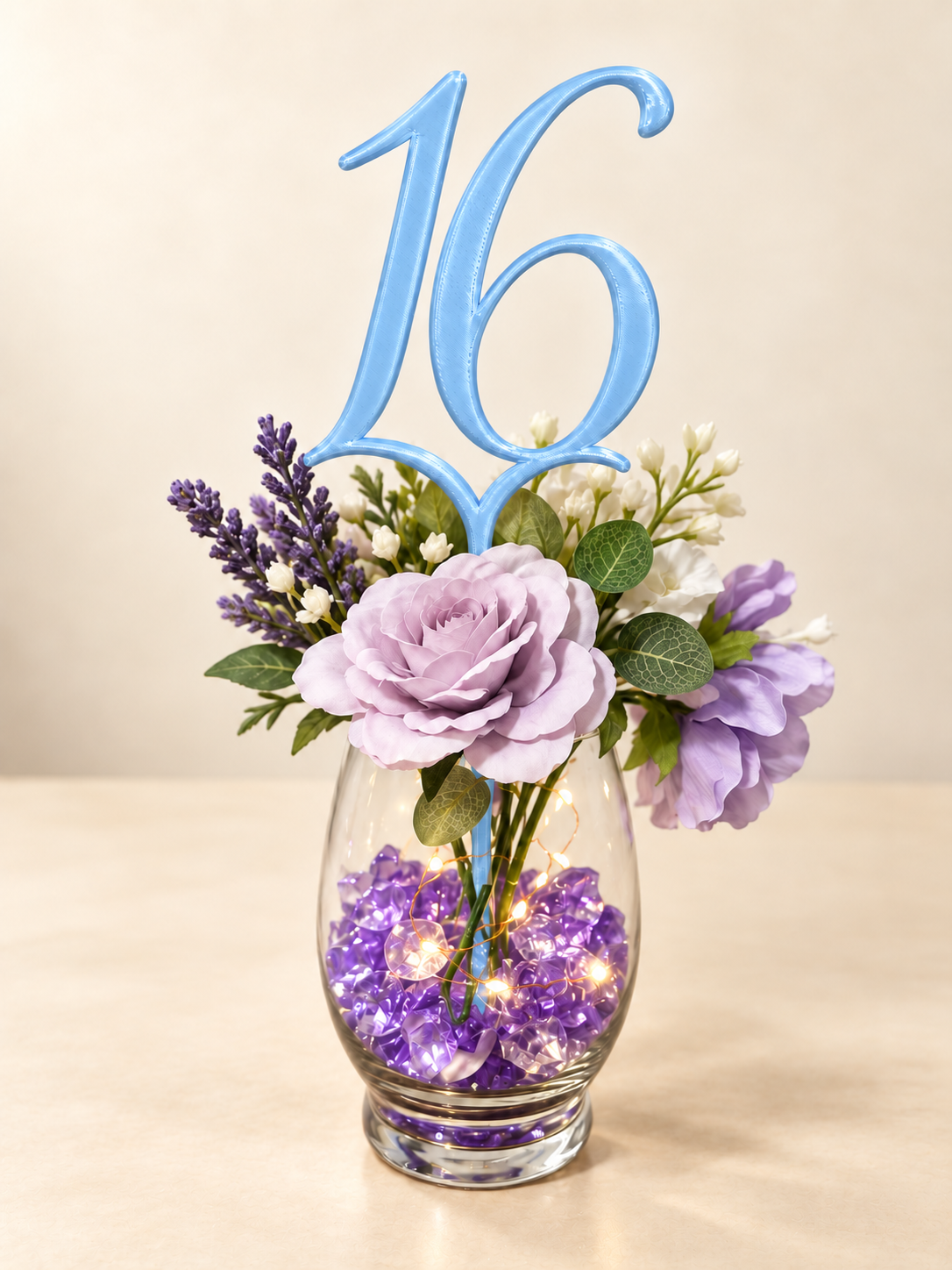 Digital mockup of number 16 centerpiece pick in light blue, floral display; props not included